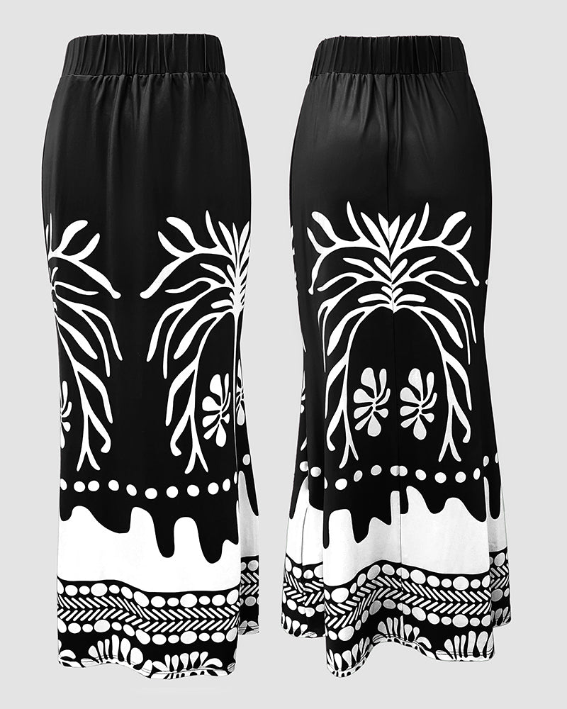 2 Pieces Outfit Skew Neck Lantern Sleeve Loose Fit Top and High Waist Elastic Waist Fishtail Maxi Skirt Set Casual Tropical Print Vacation Set