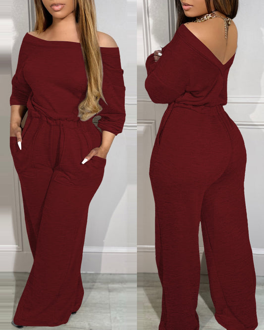 Mono casual de hombros caídos, con escote descubierto, espalda en V, cintura elástica con bolsillos, cintura ajustada y pierna ancha