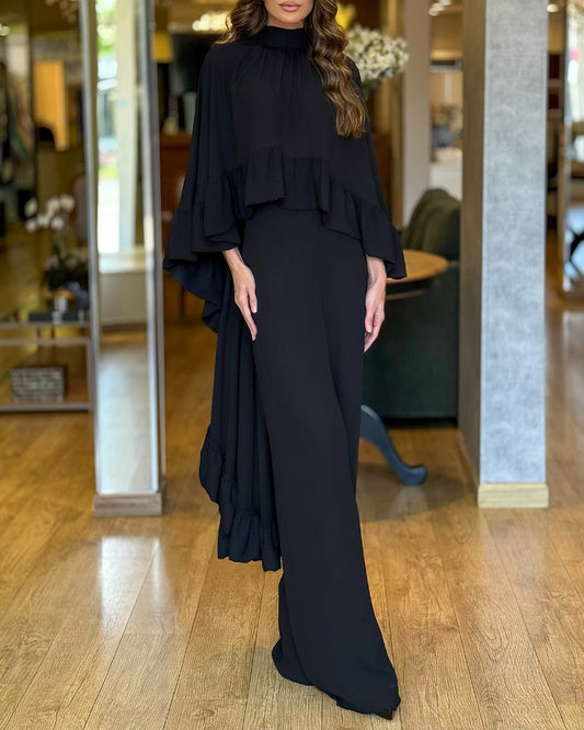 Conjunto de 2 piezas con capa de cuello alto, espalda calada, volantes y bajo asimétrico, combinada con pantalones informales de pierna ancha y cintura elástica en la espalda