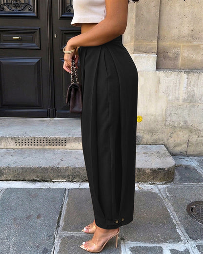 Pantalon sarouel femme taille haute à plis, poches et bas de jambes boutonnés