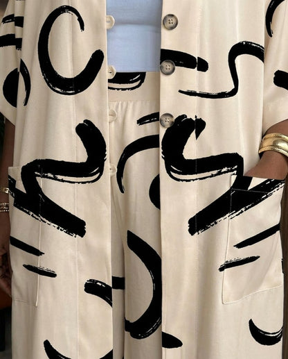 2 Pieces Outfit Batwing Sleeve Button Front Side Slit Longline Coat and Elastic Back Waist Wide Leg Pants Set Casual Abstract Print Satin Set