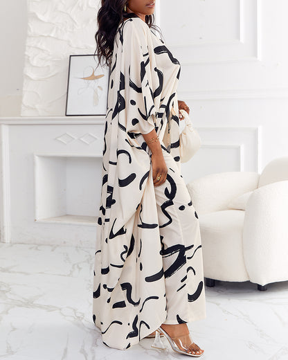 Women's 2 Piece Abstract Print Outfits V-Neck High Slit Longline Top and Wide Leg Pants Set Casual Loose Vacation Set