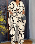 Women's 2 Piece Abstract Print Outfits V-Neck High Slit Longline Top and Wide Leg Pants Set Casual Loose Vacation Set