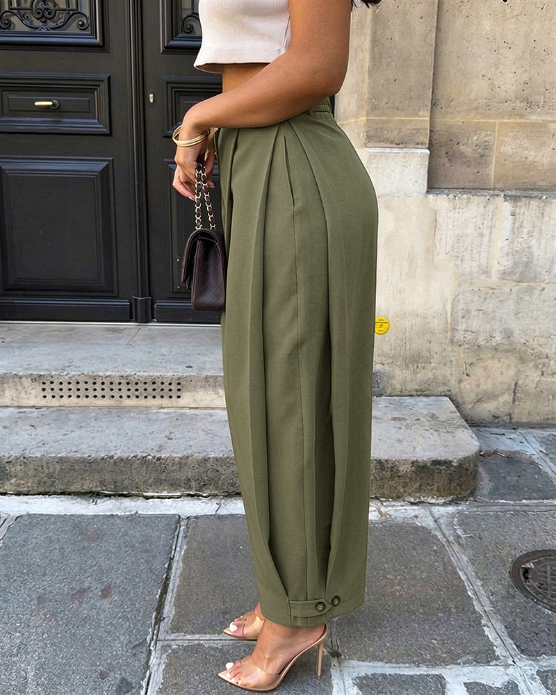 Pantalon sarouel femme taille haute à plis, poches et bas de jambes boutonnés
