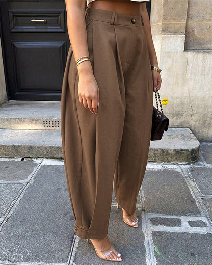 Pantalon sarouel femme taille haute à plis, poches et bas de jambes boutonnés